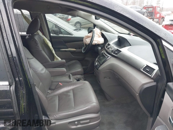 2016 Honda Odyssey EX-L with VIN 5FNRL5H65GB093937, listed as a IAAI auction lot 41691669 with 264,960 mi miles and . Bid and sale history available at DreamBid. Image 5.