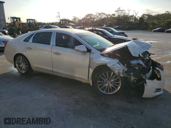 2014 Cadillac XTS Platinum z VIN 2G61W5S84E9153242, wystawiony jako Copart lot #88361685 z przebiegiem 141 401 mil mil oraz Szkoda całkowita • Salvage title. Historia ofert i sprzedaży dostępna na DreamBid. Obrazek 4.