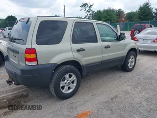 2006 Ford Escape XLT с VIN 1FMYU03146KB11557, выставлен на аукционе IAAI как лот 42433122 с пробегом 127 080 миль миль и . История ставок и продаж доступна на DreamBid. Изображение 4.
