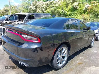 2022 Dodge Charger SXT with VIN 2C3CDXBG2NH243580, listed as a IAAI auction lot 41624754 with 38,002 mi miles and . Bid and sale history available at carsss.com. Image 4.