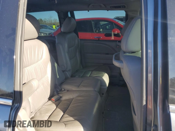 2010 Honda Odyssey EX-L с VIN 5FNRL3H65AB073831, выставлен на аукционе Copart как лот 46909995 с пробегом 143 924 миль миль и Списание • Salvage title. История ставок и продаж доступна на DreamBid. Изображение 11.
