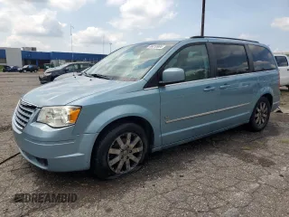 2009 Chrysler Town & Country Touring with VIN 2A8HR54X39R667914, listed as a Copart auction lot 66010904 with 214,583 mi miles and Salvage Title. Bid and sale history available at DreamBid. Image 1.