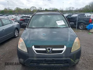 2002 Honda CR-V LX with VIN JHLRD68482C009541, listed as a IAAI auction lot 41952036 with 272,013 mi miles and . Bid and sale history available at carsss.com. Image 6.