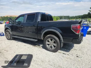 2013 Ford F-150 XL with VIN 1FTFW1EF2DFA69979, listed as a Copart auction lot 63339035 with 194,975 mi miles and Clean title. Bid and sale history available at DreamBid. Image 2.