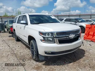 2018 Chevrolet Suburban Premier z VIN 1GNSKJKC6JR402075, wystawiony jako IAAI lot #42124796 z przebiegiem 156 900 mil mil oraz . Historia ofert i sprzedaży dostępna na DreamBid. Obrazek 1.