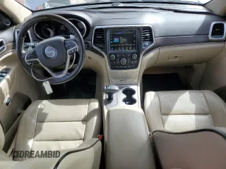 2014 Jeep Grand Cherokee Overland with VIN 1C4RJFCG4EC326325, listed as a Copart auction lot 49166645 with 128,261 mi miles and Salvage Title. Bid and sale history available at DreamBid. Image 8.