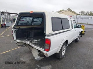 2004 Nissan Frontier XE with VIN 1N6DD26T54C403203, listed as a IAAI auction lot 41658314 with 203,648 mi miles and . Bid and sale history available at DreamBid. Image 4.