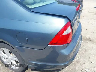 2012 Ford Fusion SE z VIN 3FAHP0HA4CR209490, wystawiony jako IAAI lot #42376506 z przebiegiem 145 622 mil mil oraz . Historia ofert i sprzedaży dostępna na DreamBid. Obrazek 6.