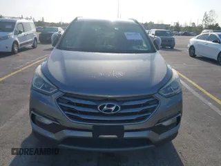 2017 Hyundai Santa Fe 2.4L z VIN 5XYZU3LB0HG420910, wystawiony jako IAAI lot #42017552 z przebiegiem 184 666 mil mil oraz . Historia ofert i sprzedaży dostępna na DreamBid. Obrazek 6.