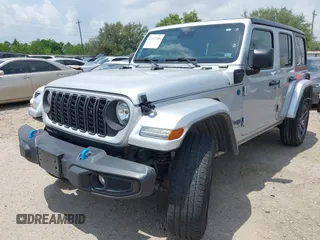 2024 Jeep Wrangler Sport S with VIN 1C4RJXN60RW208013, listed as a IAAI auction lot 42117388 with 34,407 mi miles and . Bid and sale history available at DreamBid. Image 6.
