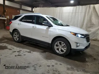 2018 Chevrolet Equinox Premier with VIN 2GNAXVEV4J6228214, listed as a Copart auction lot 51089315 with 70,451 mi miles and Salvage Title. Bid and sale history available at DreamBid. Image 4.