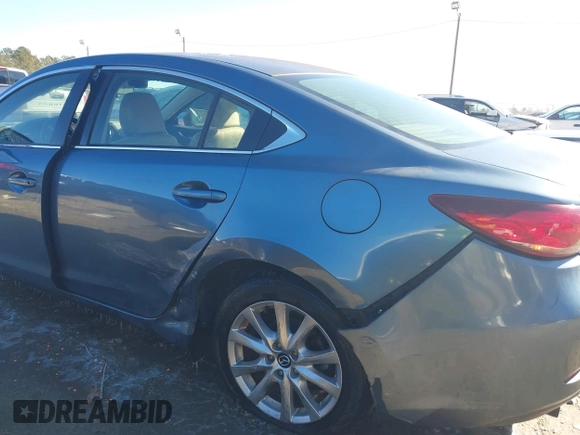 2015 Mazda 6 i Sport with VIN JM1GJ1U54F1196647, listed as a IAAI auction lot 41286544 with 133,654 mi miles and . Bid and sale history available at carsss.com. Image 6.