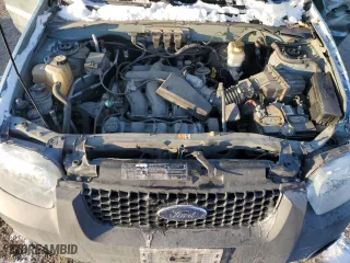 2005 Ford Escape XLT with VIN 1FMCU031X5KA29048, listed as a Copart auction lot 46323555 with 0 mi miles and Salvage Title. Bid and sale history available at carsss.com. Image 12.