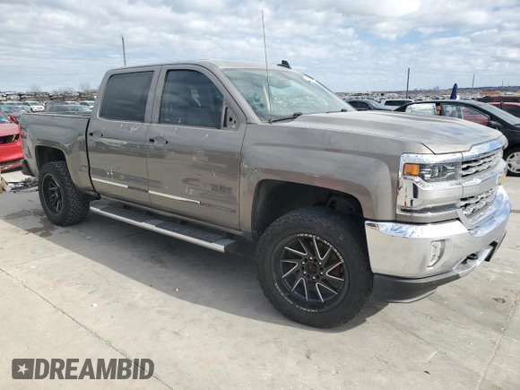 2017 Chevrolet Silverado 1500 LTZ with VIN 3GCPCSEC8HG234219, listed as a Copart auction lot 87832935 with 148,583 mi miles and Salvage Title. Bid and sale history available at DreamBid. Image 4.