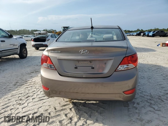 2014 Hyundai Accent GLS z VIN KMHCT4AEXEU680071, wystawiony jako Copart lot #50253905 z przebiegiem 84 454 mil mil oraz Szkoda całkowita • Salvage title. Historia ofert i sprzedaży dostępna na DreamBid. Obrazek 6.