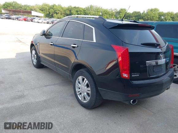2013 Cadillac SRX Luxury Collection z VIN 3GYFNCE31DS648973, wystawiony jako IAAI lot #42208689 z przebiegiem 176 115 mil mil oraz . Historia ofert i sprzedaży dostępna na DreamBid. Obrazek 3.