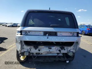 2024 Rivian R1S Adventure with VIN 7PDSGBBA4RN036045, listed as a Copart auction lot 74982414 with 9,256 mi miles and Salvage Title. Bid and sale history available at carsss.com. Image 6.