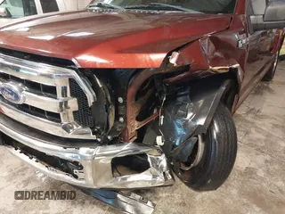 2015 Ford F-150 XLT with VIN 1FTEW1C84FKD05672, listed as a IAAI auction lot 41366154 with 119,504 mi miles and . Bid and sale history available at carsss.com. Image 6.