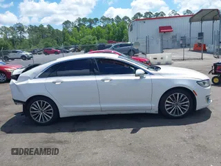 2017 Lincoln MKZ Hybrid Select z VIN 3LN6L5LUXHR600982, wystawiony jako IAAI lot #42266287 z przebiegiem 201 450 mil mil oraz . Historia ofert i sprzedaży dostępna na DreamBid. Obrazek 13.
