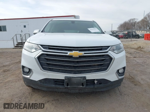 2018 Chevrolet Traverse LT Cloth z VIN 1GNEVGKW8JJ167095, wystawiony jako IAAI lot #41479356 z przebiegiem 98 615 mil mil oraz . Historia ofert i sprzedaży dostępna na DreamBid. Obrazek 13.