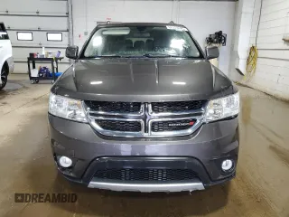 2017 Dodge Journey SXT z VIN 3C4PDDBGXHT592459, wystawiony jako Copart lot #62333025 z przebiegiem 134 778 mil mil oraz Czysty tytuł • Clean title. Historia ofert i sprzedaży dostępna na DreamBid. Obrazek 5.