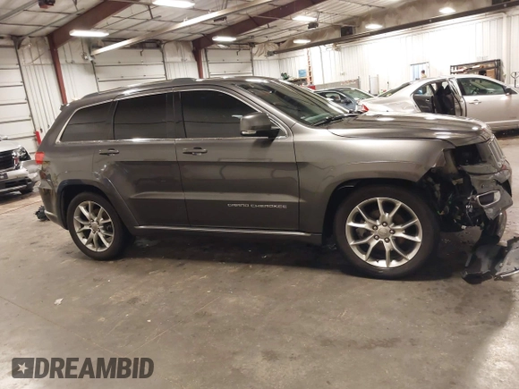 2015 Jeep Grand Cherokee Summit with VIN 1C4RJFJG4FC634129, listed as a IAAI auction lot 42481877 with 149,087 mi miles and . Bid and sale history available at DreamBid. Image 14.