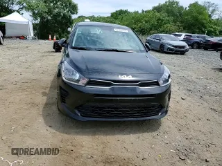 2023 Kia Rio S with VIN 3KPA24AD3PE588548, listed as a Copart auction lot 62365104 with 14,589 mi miles and Salvage Title. Bid and sale history available at carsss.com. Image 10.