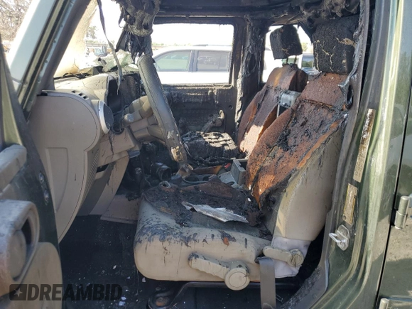 2008 Jeep Wrangler Unlimited Sahara with VIN 1J4GA59138L616722, listed as a Copart auction lot 54162835 with Not Provided miles and Salvage Title. Bid and sale history available at DreamBid. Image 7.