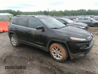 2014 Jeep Cherokee Latitude with VIN 1C4PJLCB1EW231178, listed as a IAAI auction lot 42128894 with 121,412 mi miles. Bid and sale history available at carsss.com. Image 1.