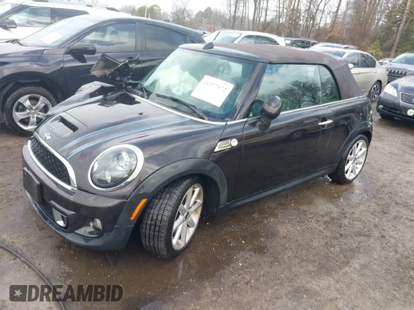 2013 MINI Convertible S with VIN WMWZP3C54DT297304, listed as a IAAI auction lot 41377572 with 101,991 mi miles and . Bid and sale history available at DreamBid. Image 17.