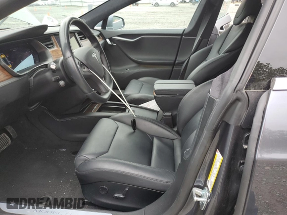 2019 Tesla Model S 75D z VIN 5YJSA1E23KF312145, wystawiony jako Copart lot #57344975 z przebiegiem 33 092 mil mil oraz Szkoda całkowita • Salvage title. Historia ofert i sprzedaży dostępna na DreamBid. Obrazek 7.