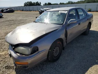 1996 Toyota Camry DX z VIN JT2BG12K7T0419839, wystawiony jako Copart lot #58267425 z przebiegiem 215 456 mil mil oraz Szkoda całkowita • Salvage title. Historia ofert i sprzedaży dostępna na DreamBid. Obrazek 1.