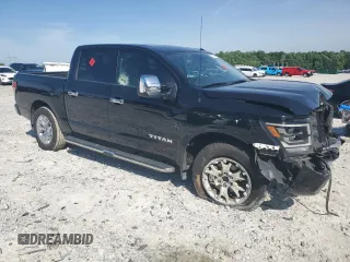 2021 Nissan Titan SL z VIN 1N6AA1ED6MN511883, wystawiony jako Copart lot #57115084 z przebiegiem 48 293 mil mil oraz Szkoda całkowita • Salvage title. Historia ofert i sprzedaży dostępna na DreamBid. Obrazek 4.