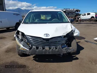 2012 Toyota Sienna with VIN 5TDZK3DC7CS203993, listed as a IAAI auction lot 41130289 with 177,059 mi miles. Bid and sale history available at carsss.com. Image 6.