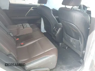 2019 Lexus RX with VIN 2T2ZZMCA3KC135292, listed as a IAAI auction lot 41573153 with 106,971 mi miles. Bid and sale history available at carsss.com. Image 8.