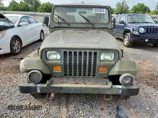 1992 Jeep Wrangler with VIN 2J4FY49S2NJ554502, listed as a Copart auction lot 63345035 with 113,897 mi miles and Clean title. Bid and sale history available at DreamBid. Image 5.
