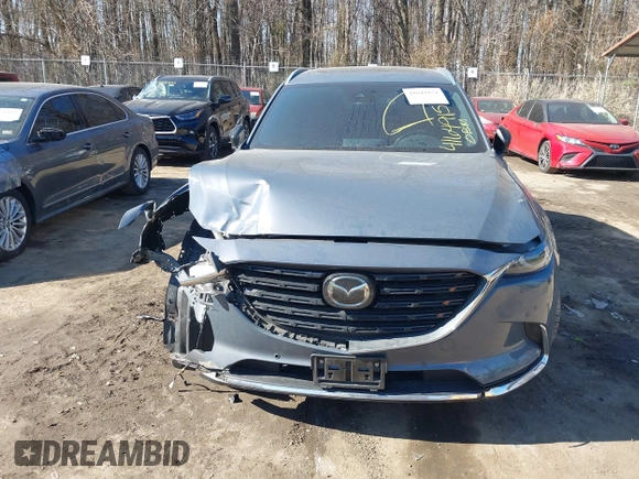 2021 Mazda CX-9 Grand Touring with VIN JM3TCBDY1M0505302, listed as a IAAI auction lot 41649151 with 67,183 mi miles and . Bid and sale history available at carsss.com. Image 12.