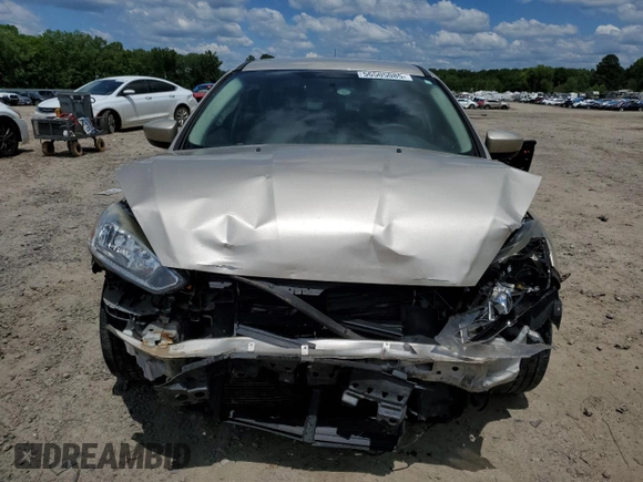 2018 Ford Focus SE z VIN 1FADP3F27JL226890, wystawiony jako Copart lot #56505085 z przebiegiem 112 865 mil mil oraz Szkoda całkowita • Salvage title. Historia ofert i sprzedaży dostępna na DreamBid. Obrazek 5.