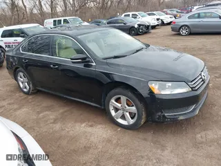 2014 Volkswagen Passat SE w/Sunroof with VIN 1VWBS7A31EC078875, listed as a IAAI auction lot 41649910 with 154,679 mi miles. Bid and sale history available at carsss.com. Image 1.