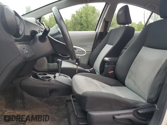 2012 Toyota Prius One z VIN JTDKDTB3XC1509615, wystawiony jako Copart lot #59868725 z przebiegiem Nie podano mil oraz Szkoda całkowita • Salvage title. Historia ofert i sprzedaży dostępna na DreamBid. Obrazek 7.