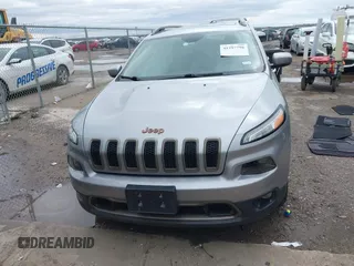 2016 Jeep Cherokee Latitude with VIN 1C4PJLCB5GW369955, listed as a IAAI auction lot 41297796 with 99,029 mi miles. Bid and sale history available at carsss.com. Image 13.