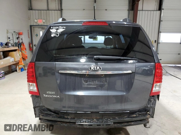 2014 Kia Sedona LX with VIN KNDMG4C77E6541368, listed as a Copart auction lot 52749305 with 130,253 mi miles and Salvage Title. Bid and sale history available at carsss.com. Image 6.
