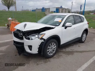 2015 Mazda CX-5 Touring with VIN JM3KE2CY3F0550624, listed as a IAAI auction lot 41931268 with 51,588 mi miles and . Bid and sale history available at carsss.com. Image 18.