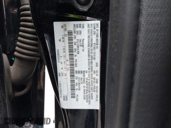 2018 Ford Focus SE with VIN 1FADP3F28JL302634, listed as a IAAI auction lot 42103219 with 71,682 mi miles and . Bid and sale history available at DreamBid. Image 9.
