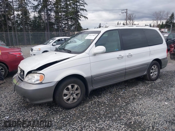 2005 Kia Sedona LX with VIN KNDUP132X56742698, listed as a IAAI auction lot 41637967 with 118,346 mi miles. Bid and sale history available at carsss.com. Image 2.