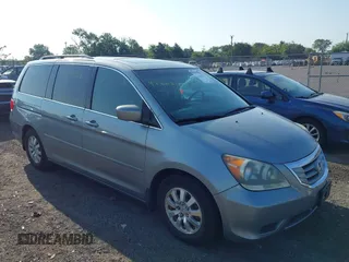 2010 Honda Odyssey EX-L z VIN 5FNRL3H76AB022198, wystawiony jako IAAI lot #42805378 z przebiegiem 264 089 mil mil oraz . Historia ofert i sprzedaży dostępna na DreamBid. Obrazek 1.
