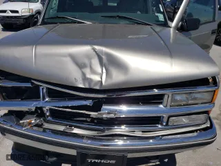 1999 Chevrolet Tahoe with VIN 3GNEK18RXXG190783, listed as a Copart auction lot 52666545 with 240,094 mi miles and Salvage Title. Bid and sale history available at carsss.com. Image 13.