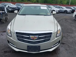 2015 Cadillac ATS Luxury RWD z VIN 1G6AB5RX8F0101942, wystawiony jako IAAI lot #42199906 z przebiegiem 58 627 mil mil oraz . Historia ofert i sprzedaży dostępna na DreamBid. Obrazek 12.