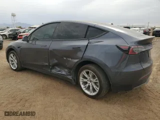 2023 Tesla Model Y Long Range with VIN 7SAYGDEE4PF900781, listed as a Copart auction lot 48164905 with 28,859 mi miles and Salvage Title. Bid and sale history available at carsss.com. Image 2.