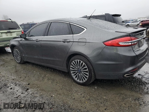 2018 Ford Fusion Titanium with VIN 3FA6P0D92JR193919, listed as a Copart auction lot 42188094 with 99,939 mi miles and Salvage title. Bid and sale history available at DreamBid. Image 2.